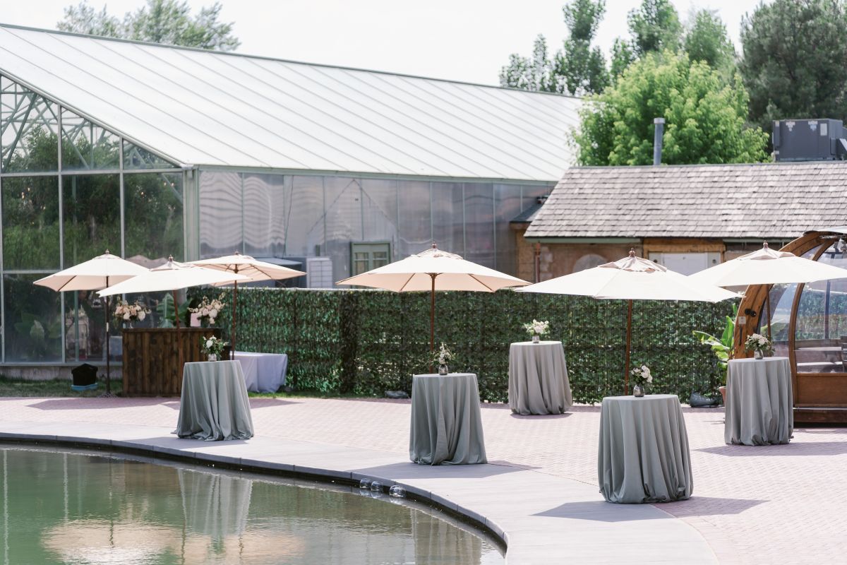 Outdoor wedding rentals for umbrellas and standing tables