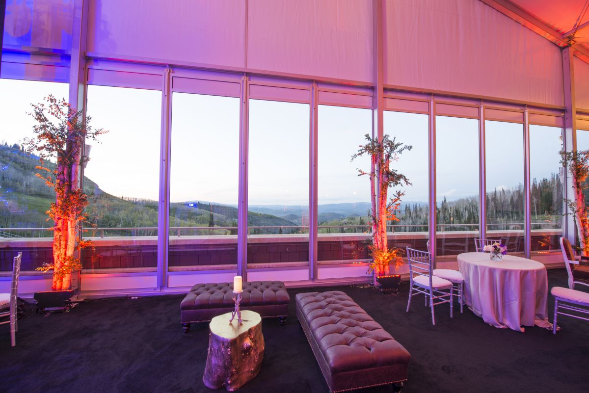 View of the exterior from inside a decorated event tent