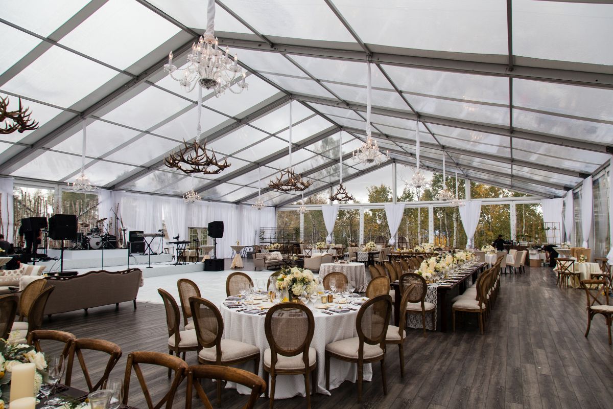 Seating arrangements for wedding inside an open tent