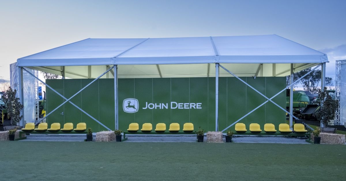 View of the John Deere logo at the Exhibitor Pavilion